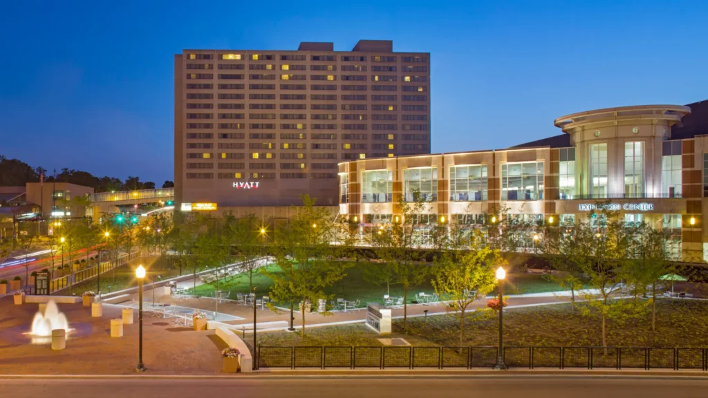 Hotel and Lexington Center lit at dusk